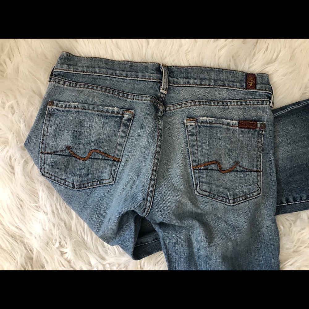 7 For All Man Kind Jeans. Flared bottom. Size 28.